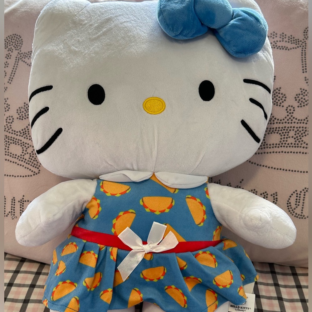 Hello Kitty Taco Dress Plush, 24 inches tall.  Excellent condition.